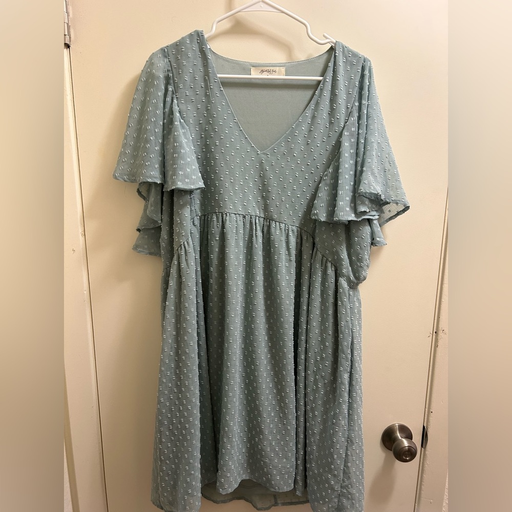 Textured, dusty blue mini dress.